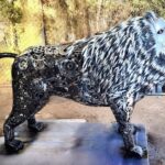 Lion en pièces mécaniques, métal recyclé, décoration artisanale imposante