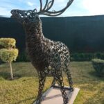 Cerf design en fers à cheval, métal, décoration artisanale extérieure vue 1