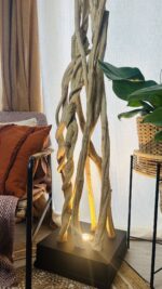 Luminaire en bois flotté fait main, ambiance chaleureuse et matériaux naturels