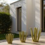 Trois agaves métalliques de différentes tailles en décoration extérieure